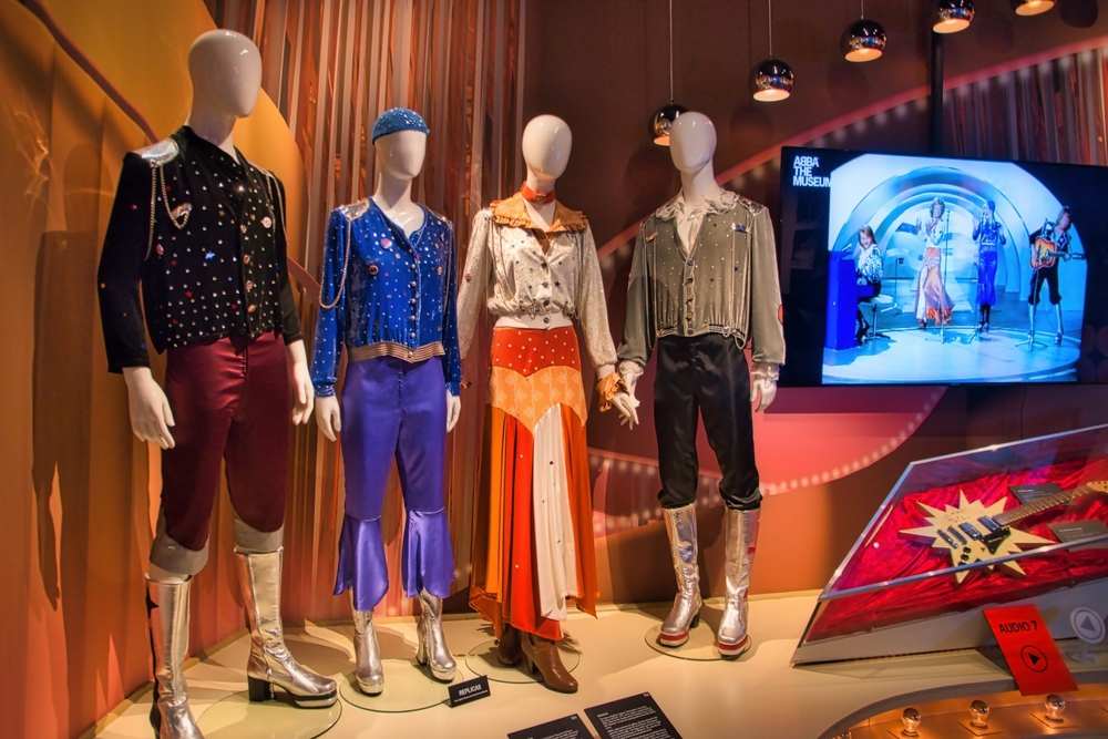 Close-up of several mannequins dressed in costumes typical of the musical group ABBA at the museum named after them in Stockholm.